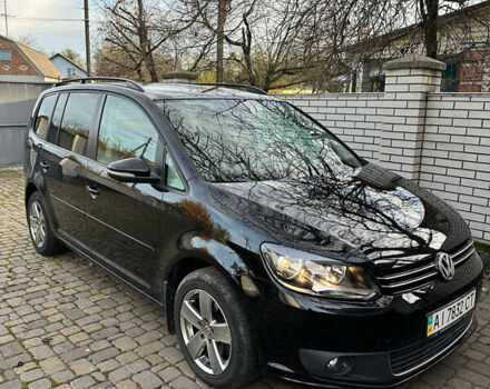 Черный Фольксваген Туран, объемом двигателя 1.39 л и пробегом 99 тыс. км за 11399 $, фото 1 на Automoto.ua