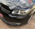 Черный Фольксваген Туран, объемом двигателя 1.4 л и пробегом 122 тыс. км за 9555 $, фото 1 на Automoto.ua