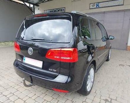 Черный Фольксваген Туран, объемом двигателя 1.98 л и пробегом 255 тыс. км за 12400 $, фото 14 на Automoto.ua