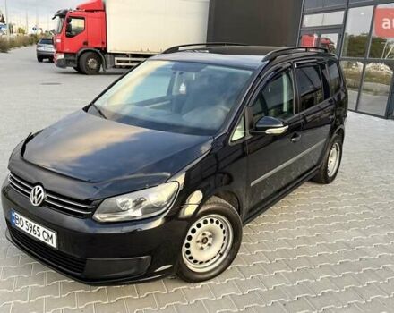 Черный Фольксваген Туран, объемом двигателя 1.6 л и пробегом 256 тыс. км за 8999 $, фото 1 на Automoto.ua