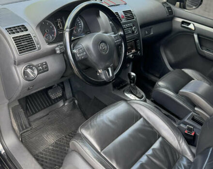 Черный Фольксваген Туран, объемом двигателя 1.39 л и пробегом 251 тыс. км за 7200 $, фото 4 на Automoto.ua