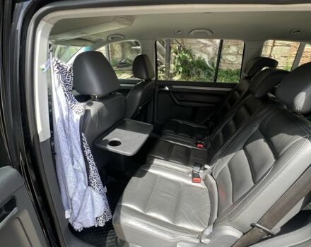 Черный Фольксваген Туран, объемом двигателя 1.4 л и пробегом 233 тыс. км за 6950 $, фото 10 на Automoto.ua