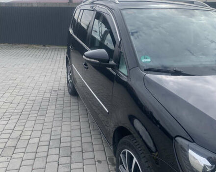 Черный Фольксваген Туран, объемом двигателя 1.97 л и пробегом 205 тыс. км за 12500 $, фото 2 на Automoto.ua