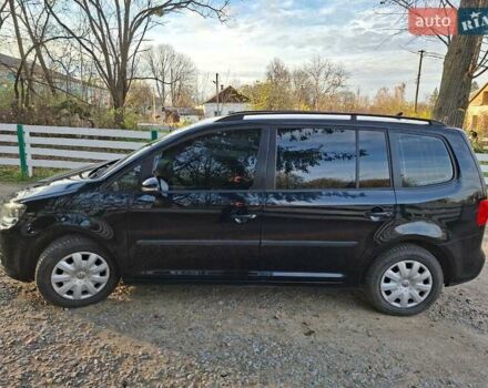 Черный Фольксваген Туран, объемом двигателя 1.6 л и пробегом 275 тыс. км за 9600 $, фото 2 на Automoto.ua