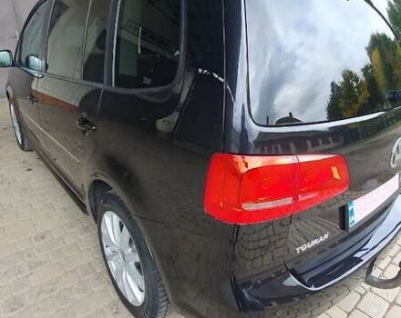 Черный Фольксваген Туран, объемом двигателя 1.98 л и пробегом 255 тыс. км за 12400 $, фото 21 на Automoto.ua