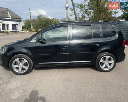 Черный Фольксваген Туран, объемом двигателя 1.39 л и пробегом 236 тыс. км за 8200 $, фото 5 на Automoto.ua