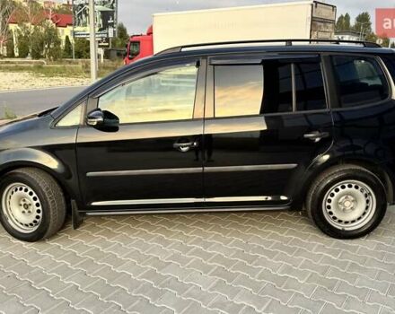 Черный Фольксваген Туран, объемом двигателя 1.6 л и пробегом 256 тыс. км за 8999 $, фото 3 на Automoto.ua