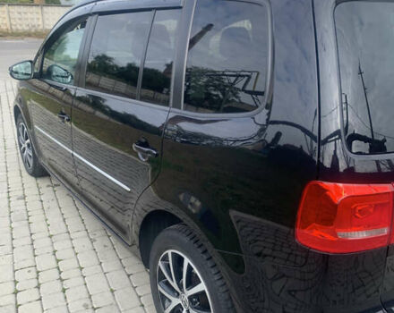 Черный Фольксваген Туран, объемом двигателя 1.97 л и пробегом 205 тыс. км за 12500 $, фото 4 на Automoto.ua