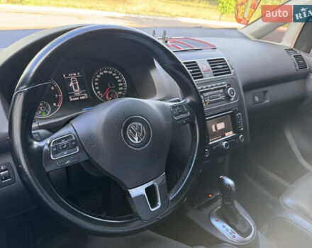 Черный Фольксваген Туран, объемом двигателя 1.39 л и пробегом 251 тыс. км за 7200 $, фото 1 на Automoto.ua