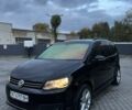 Черный Фольксваген Туран, объемом двигателя 1.4 л и пробегом 233 тыс. км за 6950 $, фото 1 на Automoto.ua