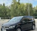 Черный Фольксваген Туран, объемом двигателя 1.6 л и пробегом 230 тыс. км за 10950 $, фото 1 на Automoto.ua