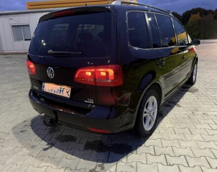 Черный Фольксваген Туран, объемом двигателя 1.6 л и пробегом 280 тыс. км за 11200 $, фото 2 на Automoto.ua