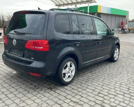 Черный Фольксваген Туран, объемом двигателя 1.6 л и пробегом 333 тыс. км за 8900 $, фото 2 на Automoto.ua