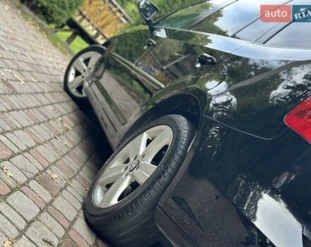 Черный Фольксваген Туран, объемом двигателя 2 л и пробегом 200 тыс. км за 11850 $, фото 91 на Automoto.ua