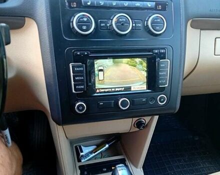 Черный Фольксваген Туран, объемом двигателя 1.4 л и пробегом 220 тыс. км за 9400 $, фото 1 на Automoto.ua