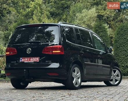 Черный Фольксваген Туран, объемом двигателя 2 л и пробегом 200 тыс. км за 11850 $, фото 4 на Automoto.ua