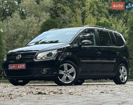 Черный Фольксваген Туран, объемом двигателя 2 л и пробегом 200 тыс. км за 11850 $, фото 83 на Automoto.ua