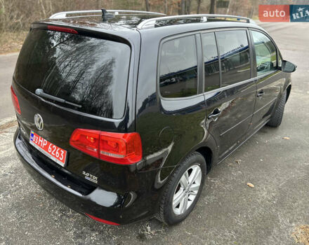 Чорний Фольксваген Туран, об'ємом двигуна 2 л та пробігом 262 тис. км за 12250 $, фото 110 на Automoto.ua