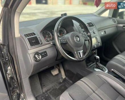 Черный Фольксваген Туран, объемом двигателя 1.97 л и пробегом 213 тыс. км за 11600 $, фото 7 на Automoto.ua