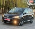 Черный Фольксваген Туран, объемом двигателя 2 л и пробегом 270 тыс. км за 11600 $, фото 1 на Automoto.ua