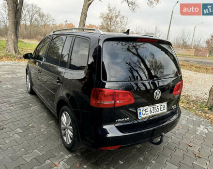 Чорний Фольксваген Туран, об'ємом двигуна 2 л та пробігом 255 тис. км за 12800 $, фото 5 на Automoto.ua
