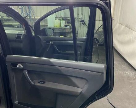 Черный Фольксваген Туран, объемом двигателя 1.6 л и пробегом 174 тыс. км за 13000 $, фото 1 на Automoto.ua