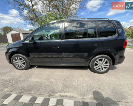 Чорний Фольксваген Туран, об'ємом двигуна 1.6 л та пробігом 228 тис. км за 11999 $, фото 4 на Automoto.ua