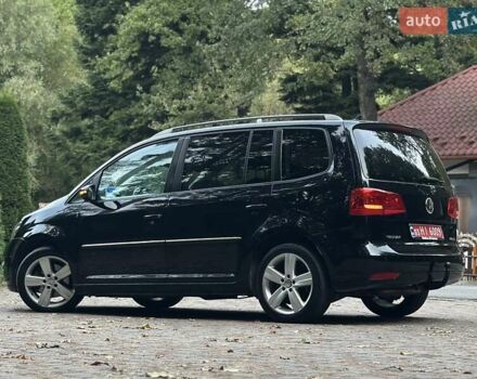 Черный Фольксваген Туран, объемом двигателя 2 л и пробегом 200 тыс. км за 11850 $, фото 88 на Automoto.ua