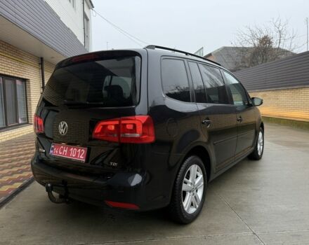 Черный Фольксваген Туран, объемом двигателя 1.6 л и пробегом 218 тыс. км за 9950 $, фото 5 на Automoto.ua