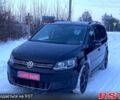 Черный Фольксваген Туран, объемом двигателя 1.4 л и пробегом 21300 тыс. км за 9700 $, фото 1 на Automoto.ua
