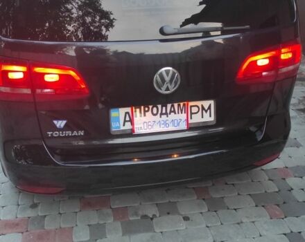 Черный Фольксваген Туран, объемом двигателя 2 л и пробегом 200 тыс. км за 12800 $, фото 2 на Automoto.ua