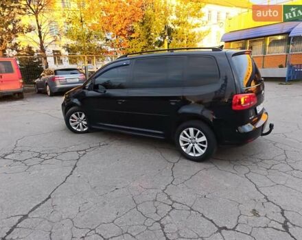 Чорний Фольксваген Туран, об'ємом двигуна 1.6 л та пробігом 298 тис. км за 9100 $, фото 1 на Automoto.ua