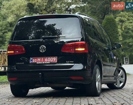 Черный Фольксваген Туран, объемом двигателя 2 л и пробегом 200 тыс. км за 11850 $, фото 93 на Automoto.ua