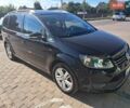 Черный Фольксваген Туран, объемом двигателя 1.6 л и пробегом 255 тыс. км за 9000 $, фото 1 на Automoto.ua