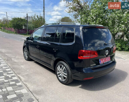 Чорний Фольксваген Туран, об'ємом двигуна 1.6 л та пробігом 228 тис. км за 11999 $, фото 1 на Automoto.ua