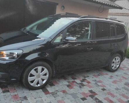 Черный Фольксваген Туран, объемом двигателя 2 л и пробегом 200 тыс. км за 12800 $, фото 1 на Automoto.ua