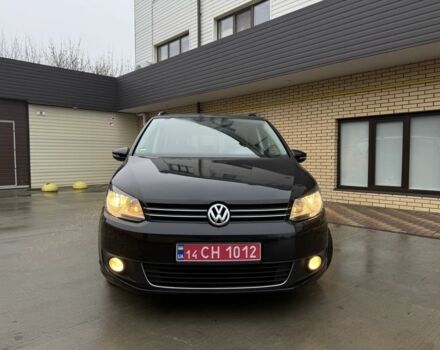 Черный Фольксваген Туран, объемом двигателя 1.6 л и пробегом 218 тыс. км за 9950 $, фото 1 на Automoto.ua