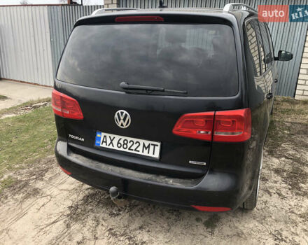 Черный Фольксваген Туран, объемом двигателя 1.97 л и пробегом 320 тыс. км за 8700 $, фото 2 на Automoto.ua