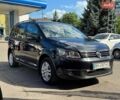 Черный Фольксваген Туран, объемом двигателя 1.4 л и пробегом 190 тыс. км за 6999 $, фото 1 на Automoto.ua