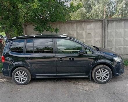 Черный Фольксваген Туран, объемом двигателя 1.4 л и пробегом 220 тыс. км за 9400 $, фото 7 на Automoto.ua