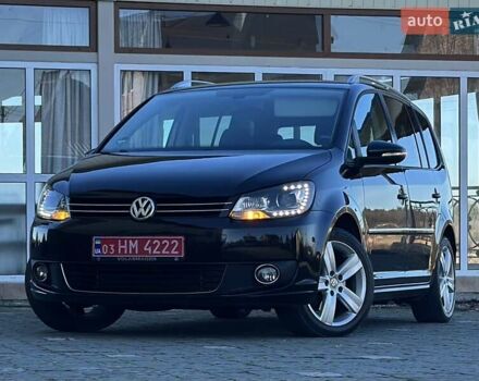 Черный Фольксваген Туран, объемом двигателя 2 л и пробегом 200 тыс. км за 11777 $, фото 1 на Automoto.ua