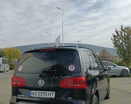 Черный Фольксваген Туран, объемом двигателя 1.97 л и пробегом 101 тыс. км за 12500 $, фото 4 на Automoto.ua