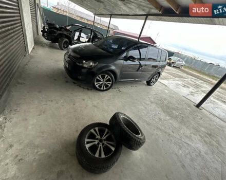 Черный Фольксваген Туран, объемом двигателя 1.4 л и пробегом 170 тыс. км за 7300 $, фото 3 на Automoto.ua