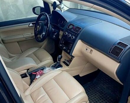 Черный Фольксваген Туран, объемом двигателя 1.4 л и пробегом 220 тыс. км за 9400 $, фото 10 на Automoto.ua