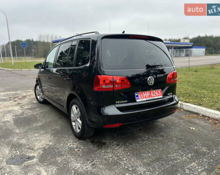 Чорний Фольксваген Туран, об'ємом двигуна 2 л та пробігом 262 тис. км за 12250 $, фото 108 на Automoto.ua