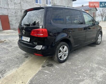 Черный Фольксваген Туран, объемом двигателя 1.97 л и пробегом 213 тыс. км за 11600 $, фото 13 на Automoto.ua