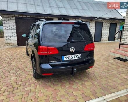 Черный Фольксваген Туран, объемом двигателя 1.6 л и пробегом 204 тыс. км за 11950 $, фото 13 на Automoto.ua