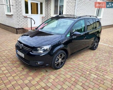 Черный Фольксваген Туран, объемом двигателя 1.6 л и пробегом 204 тыс. км за 11950 $, фото 4 на Automoto.ua