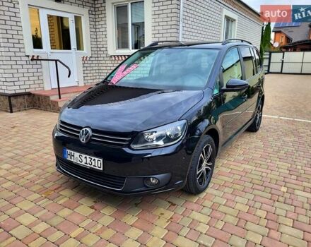 Черный Фольксваген Туран, объемом двигателя 1.6 л и пробегом 204 тыс. км за 11950 $, фото 2 на Automoto.ua