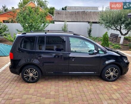 Черный Фольксваген Туран, объемом двигателя 1.6 л и пробегом 204 тыс. км за 11950 $, фото 19 на Automoto.ua